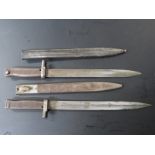 Two German Ersatz all steel bayonets, one stamped 427, the other 6242 to the crosspiece, blade