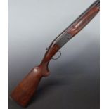 Beretta 686 Onyx 12 bore over and under ejector shotgun with named lock, chequered semi-pistol
