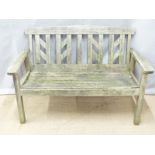 A garden bench and folding table