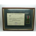 German WWI Cross of Honour with Swords medal, mounted and framed with certificate