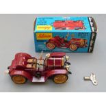 Schuco Micro Racer clockwork diecast model Mercer Typ 35 J 1913 with maroon body, gold grille and