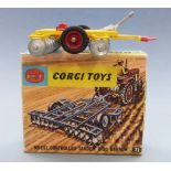 Corgi Toys diecast model Wheel Controlled Tandem Disc Harrow with yellow red and silver body, 71, in
