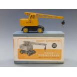 Dinky Supertoys diecast model Coles Mobile Crane with black base and yellow superstructure and hubs,