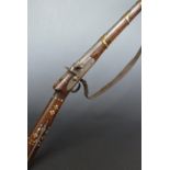 Indian percussion hammer action toradar rifle with bone inlaid stock, engraved lock, engraved