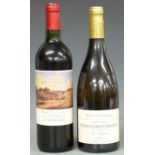 Two bottles of french wine. Les Fontaines grande reserve Puligny-Montrachet 2011 white wine,