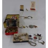 A collection of jewellery including Ronson lighter, buttons, silver ring etc