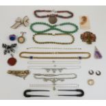 A collection of jewellery including a silver and coral necklace, diamanté necklaces, Butler & Wilson