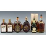 Six bottles of assorted spirits comprising Benedictine in original presentation box, two bottles