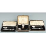 Two cased hallmarked silver fork and spoon sets and a cased hallmarked silver egg cup and spoon set,