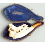 A carved Meerschaum pipe depicting a horse and fallen jockey, in original Austrian case, L12cm