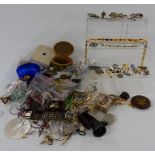 A collection of vintage jewellery including amber necklace, WBS silver brooch, paste necklaces,