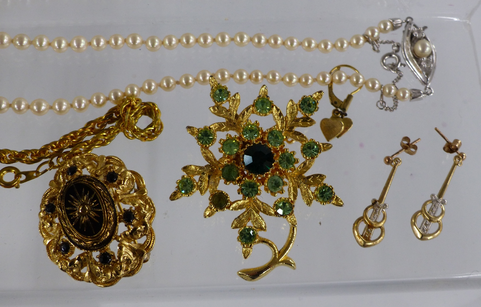 A collection of costume jewellery including silver, pair of 9ct gold earrings, brooches etc, in - Image 2 of 5