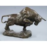 Bronze figure of a charging bull, unsigned, L25 H16cm