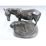 Russian cast iron figure of mare and foal with impressed marks to base, dated 1973, H30.5cm