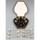 Cased set of six hallmarked silver spoons, marked to lid Frost Winchester, together with five