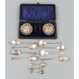 Cased pair of Edward VII hallmarked silver salts with embossed decoration, Birmingham 1901 maker