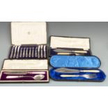 Cased set of 12 hallmarked silver handled cake knives and forks and three further cased sets of