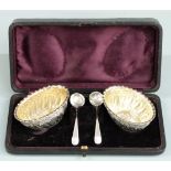 Cased pair of Victorian hallmarked silver open salts and spoons, salts Sheffield 1890 maker James