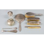 Hallmarked silver dressing table items comprising hand mirror and three various brushes,