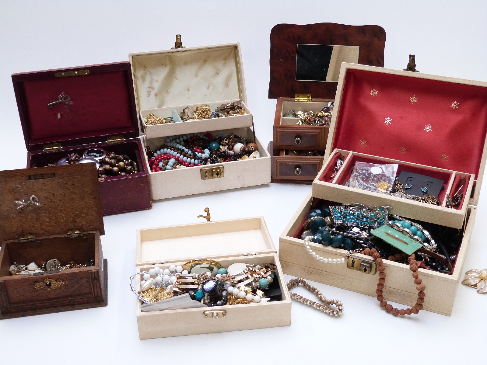 A collection of costume jewellery including brooches, earrings, necklaces, etc