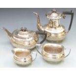 Four piece silver plated tea service by Barker Brothers, with lobed lower section, height of tallest