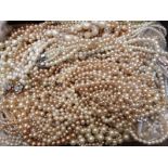 A collection of faux pearl necklaces, vintage and modern paste/ diamanté