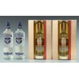 Four bottles of premium label vodka comprising two Smirnoff Triple Distilled, export strength, no.