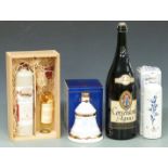 Five bottles of assorted alcohol comprising cased cornwine and Ceylon Cinammon, boxed Bell's Extra