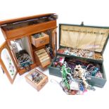 A collection of costume jewellery including beads, vintage brooches etc