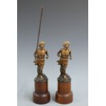 Pair of Bergman cold painted bronze figures of running men with turbans, one carrying a spear, one