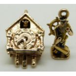A 9ct gold charm in the form of a cuckoo clock with movable hands and cuckoo and a 9ct gold charm in