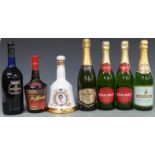 Seven bottles of assorted alcohol comprising three bottles of various sparkling perry, Tia Maria