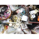A collection of costume jewellery including rings, brooches, beads, Rolex box, coins, silver