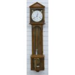 Hermle German three train chiming regulator wall clock in oak case with apex top and glass panels to