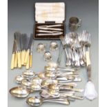 A quantity of silver plated cutlery including fiddle pattern basting spoon, spring loaded