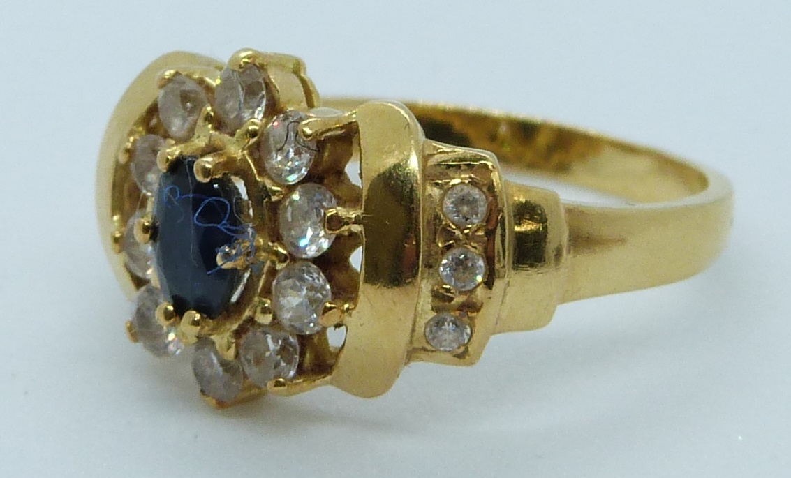 A 9ct gold ring set with a sapphire and diamonds and another yellow metal ring set with paste, - Image 2 of 3