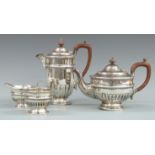 Walker & Hall George V hallmarked silver four piece teaset with lobed lower body, Sheffield 1928,