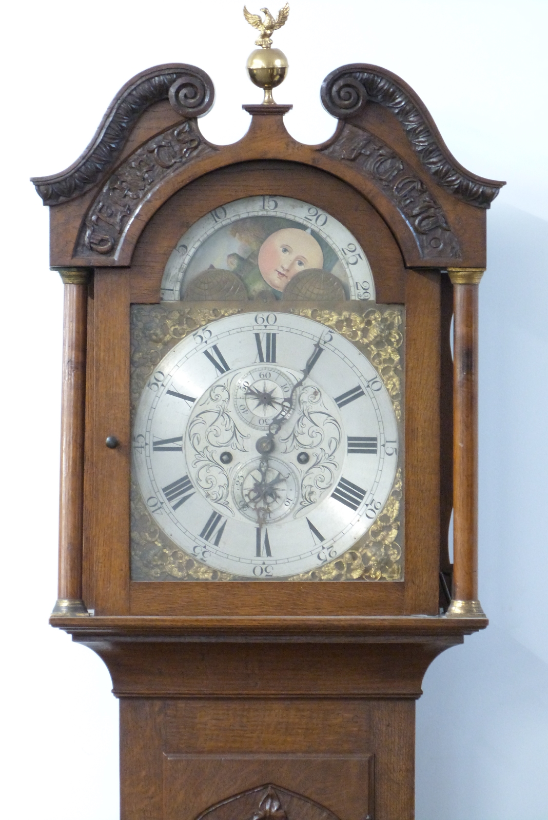 A 19thC English oak 8-day duration longcase clock with carved decoration, the silvered Roman - Image 2 of 3