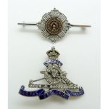 Two silver military sweetheart brooches, one for the Royal Artillery and set with enamel and