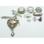 A silver filigree pendant, three Victorian white metal brooches, blister pearl brooch and Charles