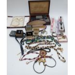 A collection of costume jewellery including vintage watches, vintage boxes, three Swatch watches,