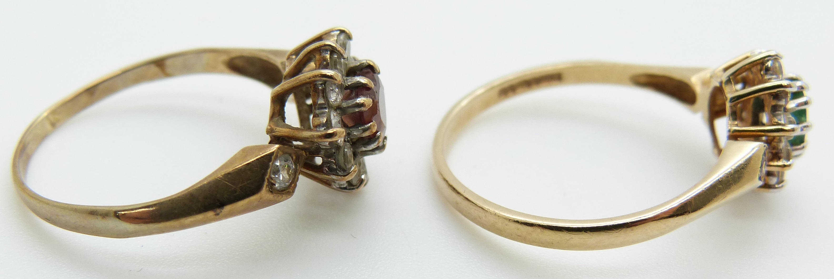 A 9ct gold ring set with a garnet surrounded by cubic zirconia and another 9ct gold ring set with an - Image 3 of 3