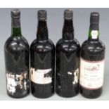 Four bottles of vintage Port, comprising two bottles of Sandemans 1970, Cockburns 1970 and "Peers