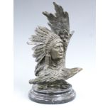 A bronze bust of a native American Indian Chief with eagle, on a circular marble plinth, H34cm