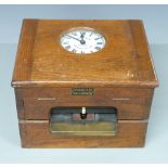 Time Recorder clocking in clock with 'Gledhill-Brook, Huddersfield' to dial, H28cm
