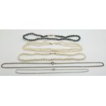 Three cultured pearl necklaces and a silver chain
