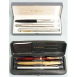 Six various pens comprising Waterman fountain pen with brown marbled body and 18ct gold nib,