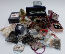 A collection of costume jewellery including silver and abalone bracelet, silver necklace,