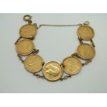 A 9ct gold bracelet set with seven half sovereigns, 1905, 1908, 1908, 1905, 1910, 1910, 1911, 38g