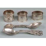 Three various hallmarked silver napkin rings and two Danish silver spoons, both by A.Michelsen of